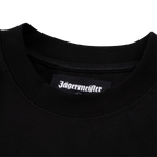Close-up of a black Jägermeister T-shirt collar featuring a woven Jägermeister logo label inside the neckline.