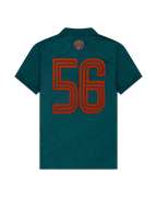 Camisola verde Jägermeister com um '56' cor de laranja nas costas.
