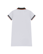 White polo dress with green and orange collar details from the back