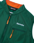 Green vest with orange interior and white Jägermeister branding.